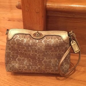 Coach gold and silver wristlet